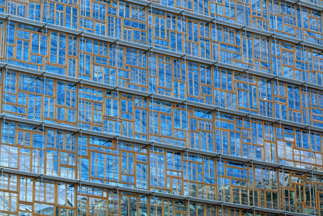 Modern glass office building exterior in Brussels